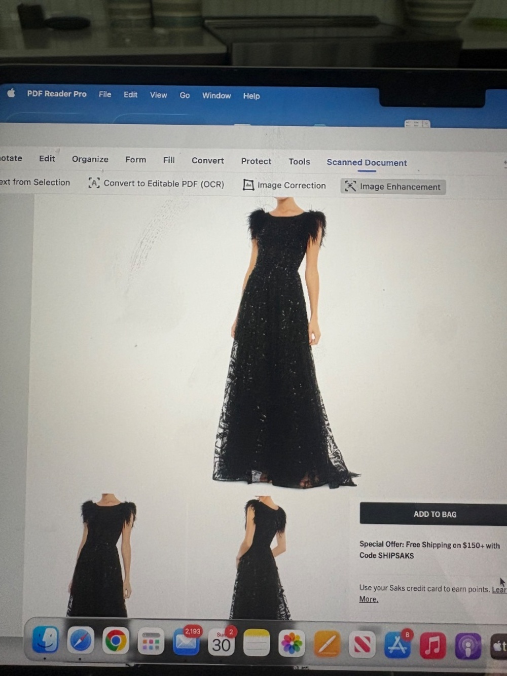 Mac Douggal feather trimmed a line gown